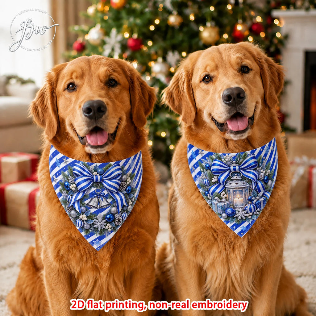 Two golden retriever dogs wearing matching blue and white striped holiday bandanas with bows, snowflakes, bells, and lantern designs, posed in front of a decorated Christmas tree and wrapped gifts. Text at the bottom reads '2D flat printing, non-real embroidery'.