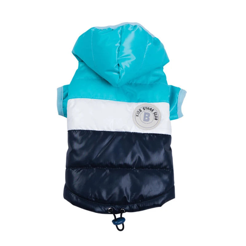 Two-tone blue dog coat with a visible brand logo on a white background