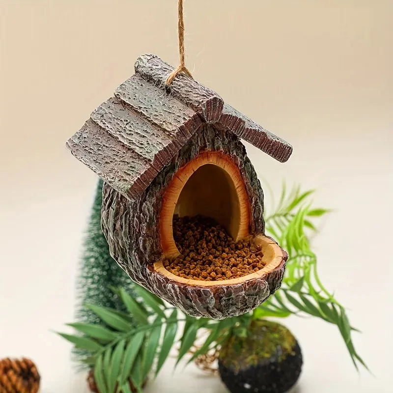 Tree bark-textured bird feeder with seeds, hanging against a neutral background with greenery.