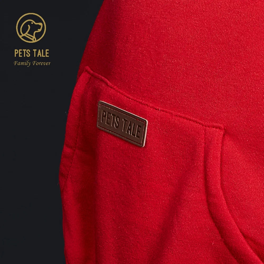 Red fabric with a 'Pets Tale' label on a dark background