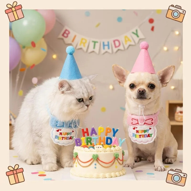 A fluffy white cat and a small tan dog sit side by side in front of a birthday cake, each wearing a party hat and bib with colorful 'Happy Birthday' text. Balloons, string lights, and a 'BIRTHDAY' banner decorate the background.