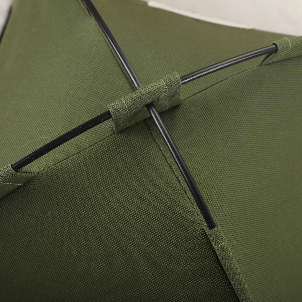 Close-up of a green umbrella with a black handle