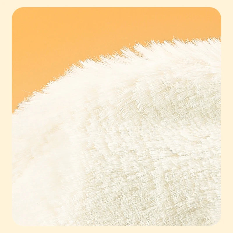 Close-up of a fluffy white rug on an orange background