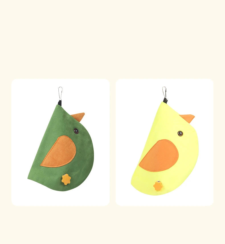 Two avocado-shaped pouches, one green and one yellow, on a beige background.