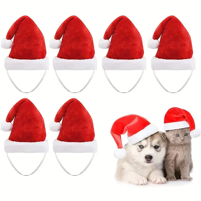 Six red Santa hats with white trim and white ear loops are shown on a white background, with two small animals wearing one hat each in the lower right corner.