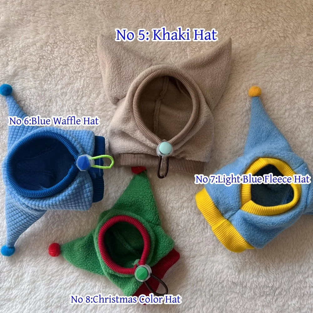 Collection of colorful hats on a textured surface