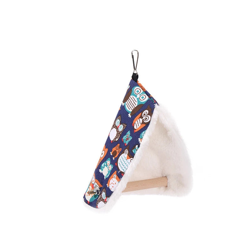Hanging pet bed with owl pattern on a white background