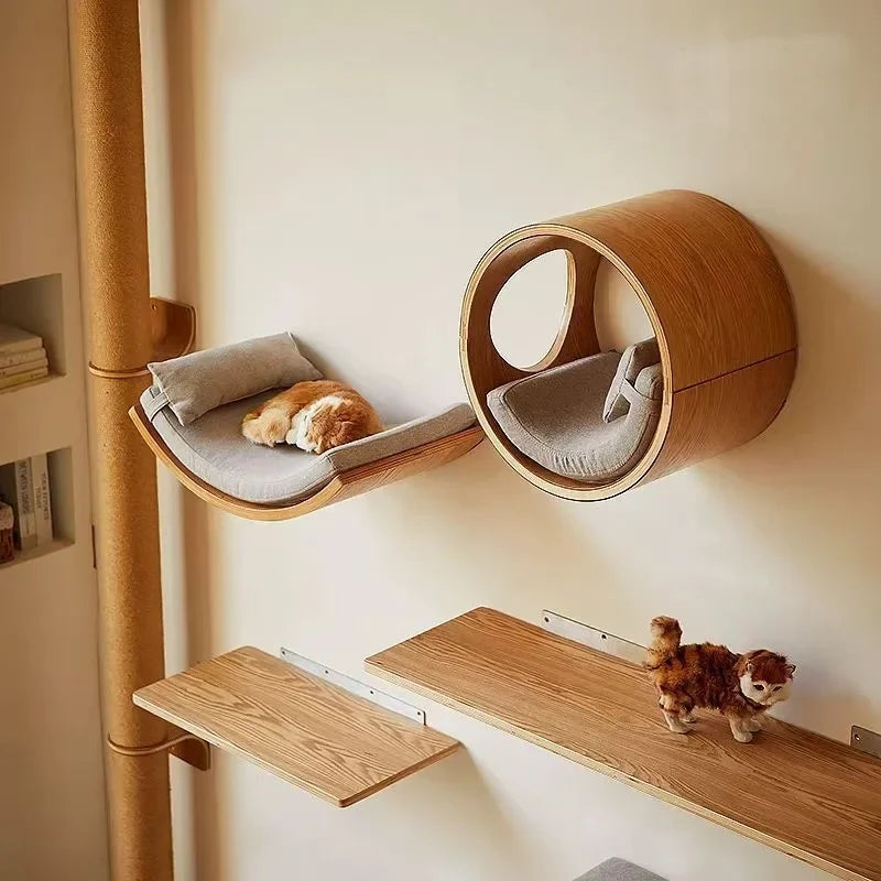 Wooden pet furniture with shelves and a cylindrical nook on a white wall.