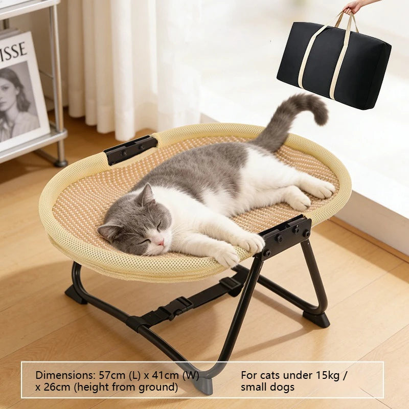 Cat lying on a portable pet bed with dimensions and weight capacity displayed.