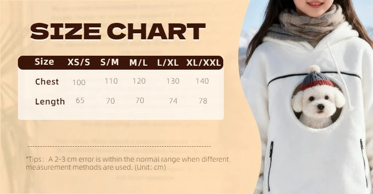 A size chart graphic for a pet hoodie, showing a table with chest and length measurements for sizes XS/S through XXL. The left side has a beige background with the text 'SIZE CHART' and measurement tips, while the right side shows a woman outdoors wearing a white hoodie with a small white dog peeking out from a front pocket.