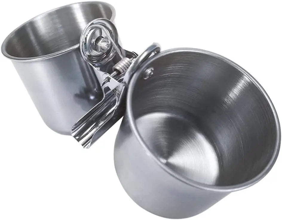 Two stainless steel dog bowls with a holder on a white background