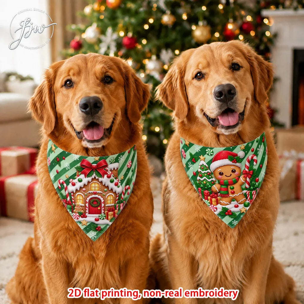 Two golden retriever dogs wearing festive Christmas bandanas in front of a decorated Christmas tree and wrapped gifts. The bandanas feature holiday prints including a gingerbread house and a gingerbread man, with green and white striped borders.