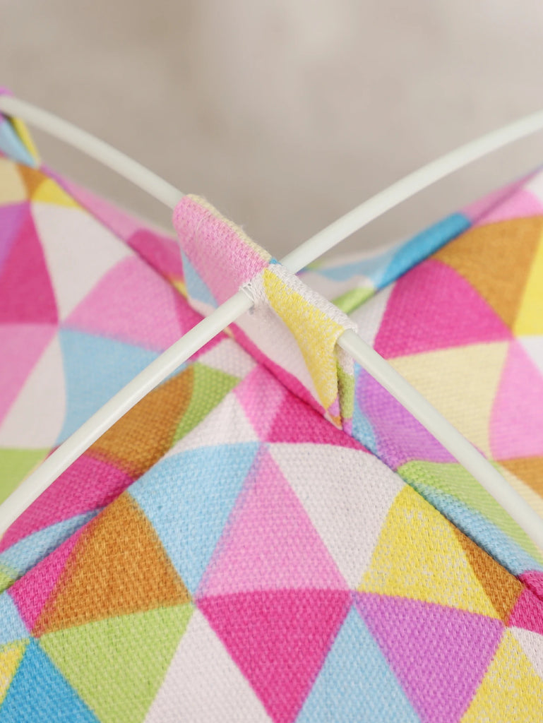 Colorful geometric-patterned fabric with a close-up view