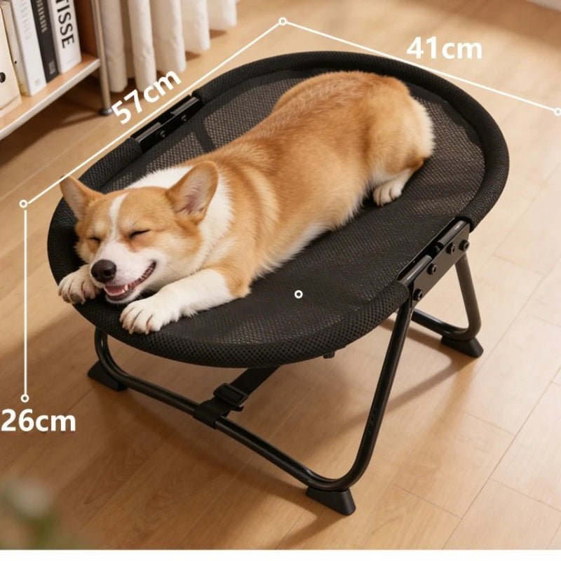 Dog lying on a black pet bed with measurements indicated