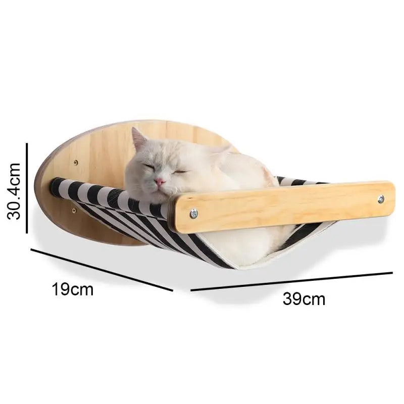 Cat lying on a wall-mounted hammock with dimensions indicated