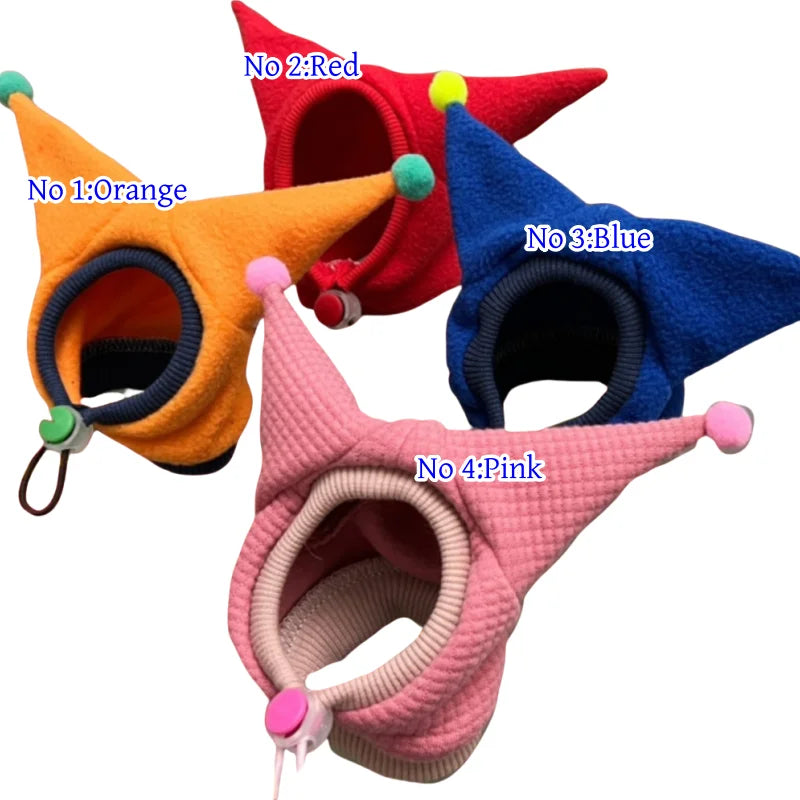 Four colorful pet cat hats in different colors on a white background