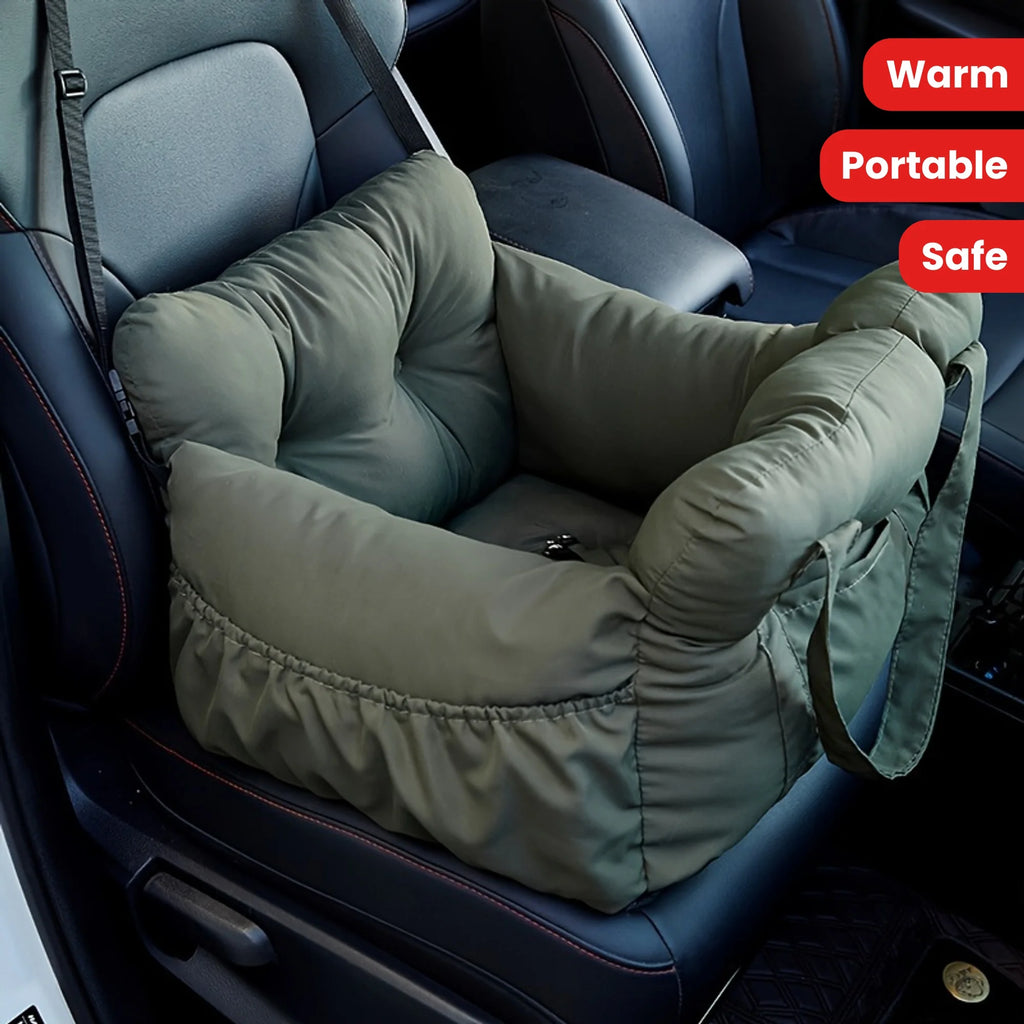 Green pet seat cover on a car seat with 'Warm', 'Portable', and 'Safe' text.