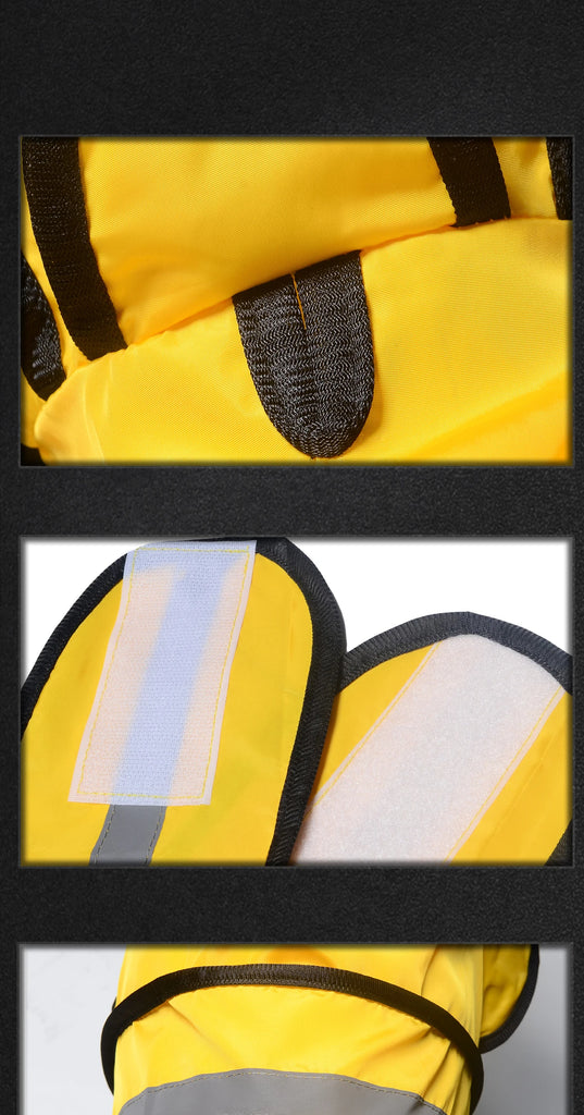Close-up of a yellow safety vest with reflective stripes and black straps.