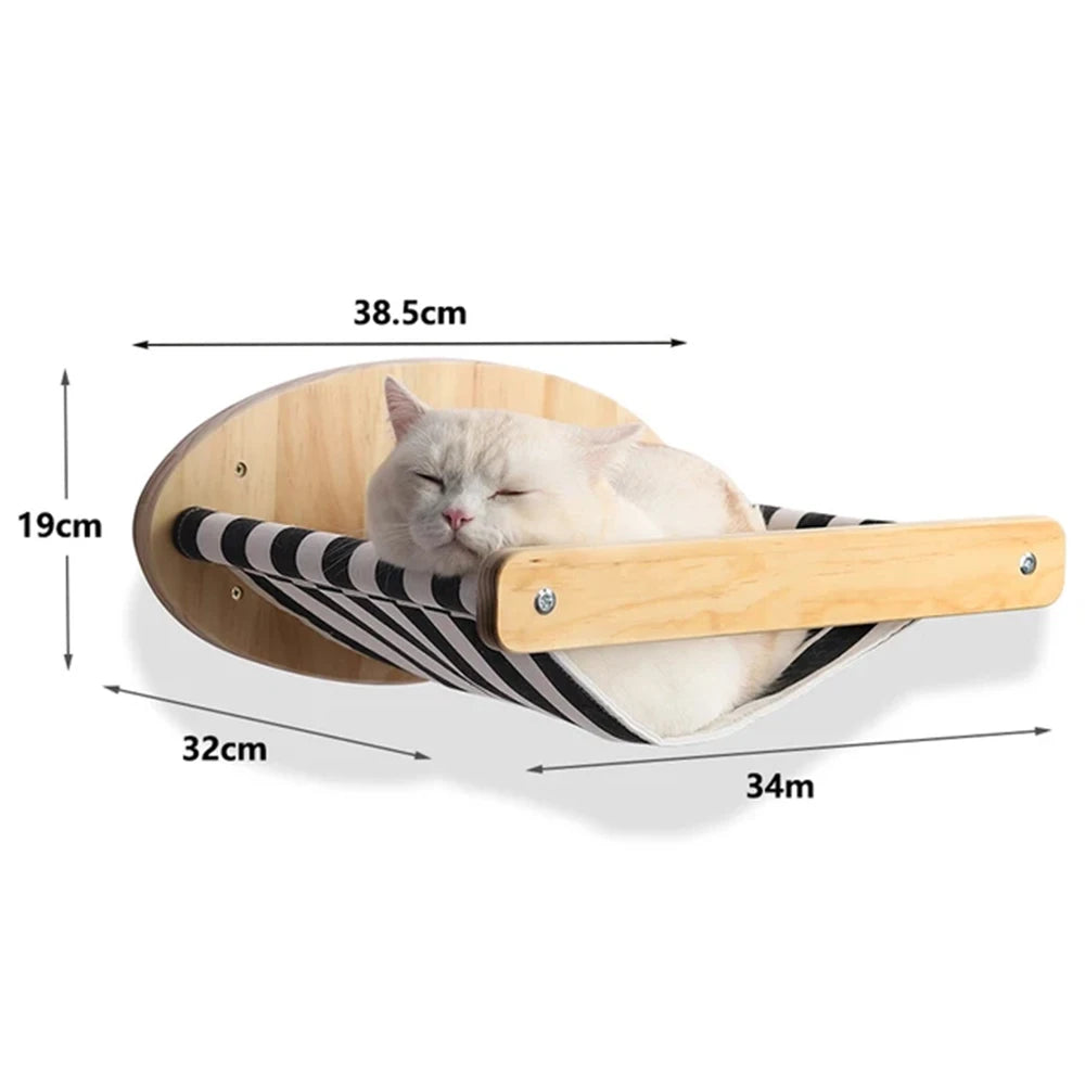 Cat lying on a wooden and fabric cat hammock with dimensions indicated.