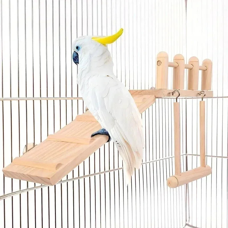 White parrot perched on a wooden bird perch inside a cage.