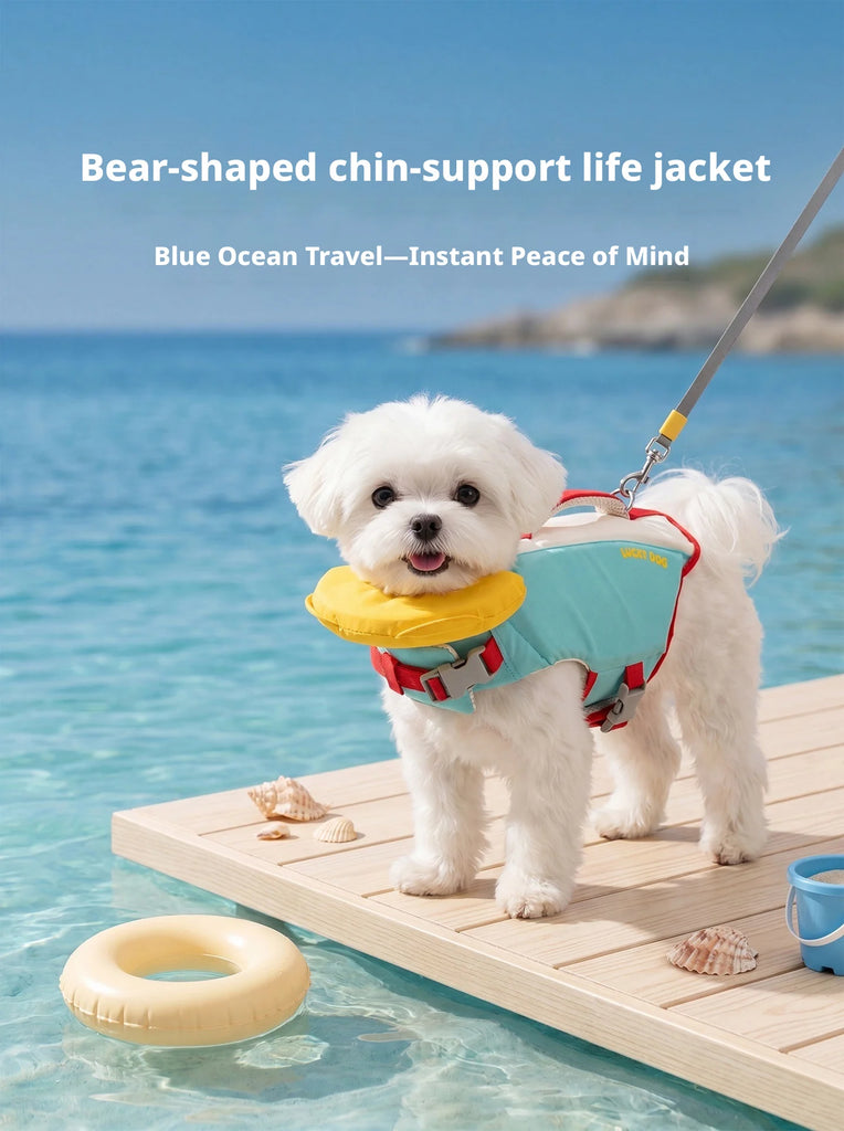 A small white dog standing on a wooden dock in clear blue water, wearing a blue and yellow life jacket with red straps. White text at the top reads 'Bear-shaped chin-support life jacket' and 'Blue Ocean Travel—Instant Peace of Mind.
