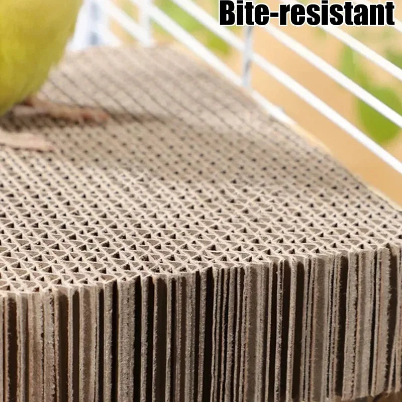 Bite-resistant material with a textured surface, likely cardboard, on a blurred background.