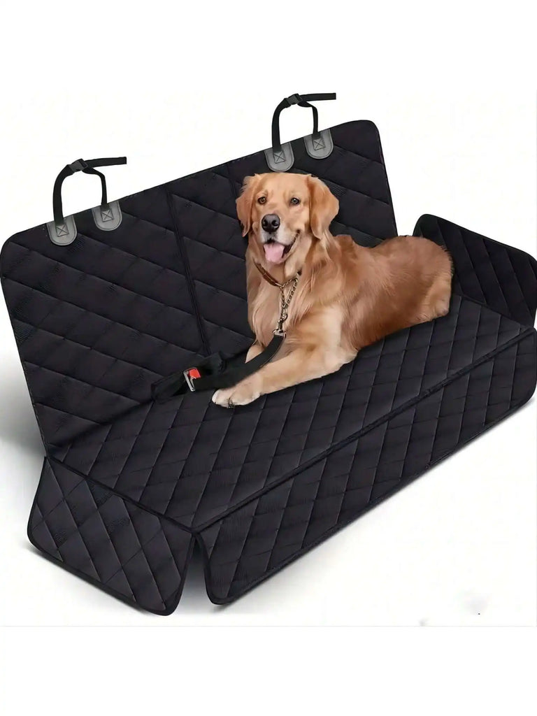 Dog lying on a black car seat cover with quilted pattern