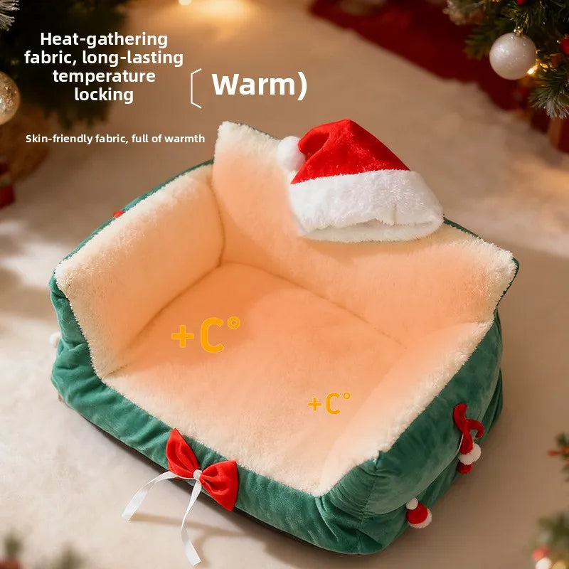 Christmas-themed pet bed with a Santa hat and decorations on a neutral background
