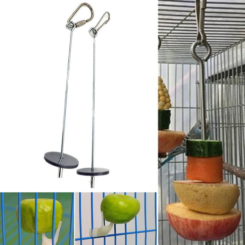 Bird toy with hanging platforms and a fruit stand inside a birdcage.
