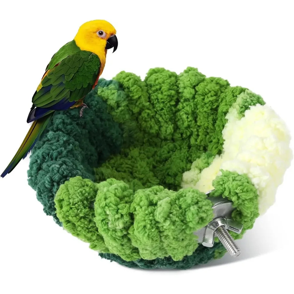 Green and white bird nest with a parrot perched on top