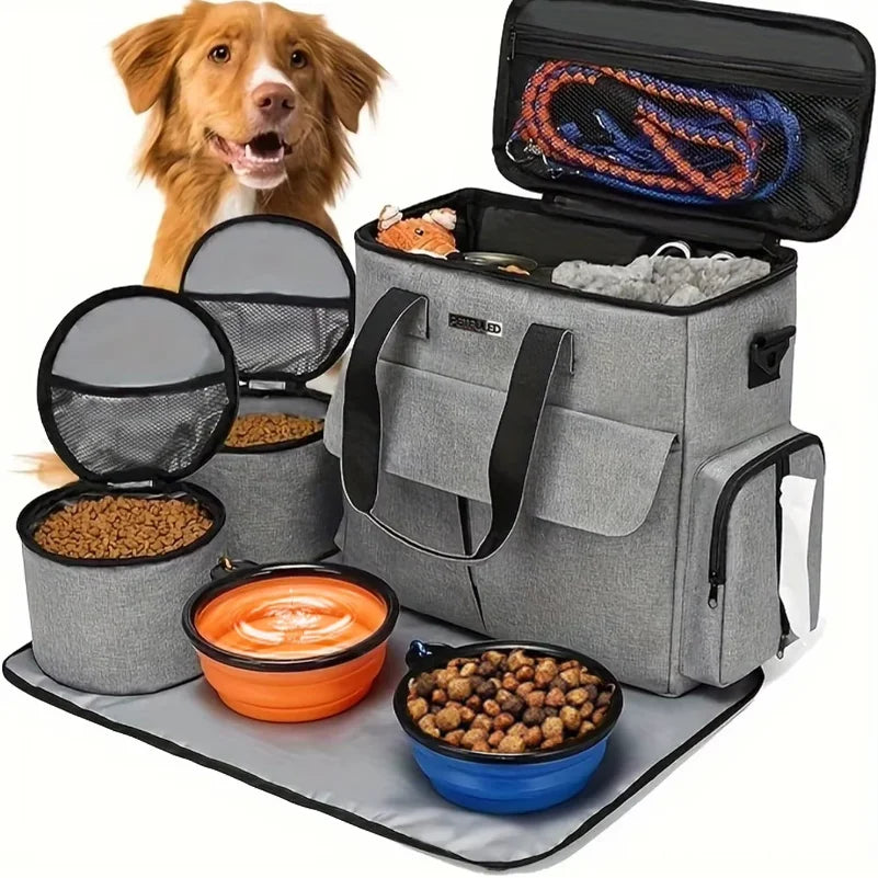 Pet travel bag with food bowls and a dog on a white background