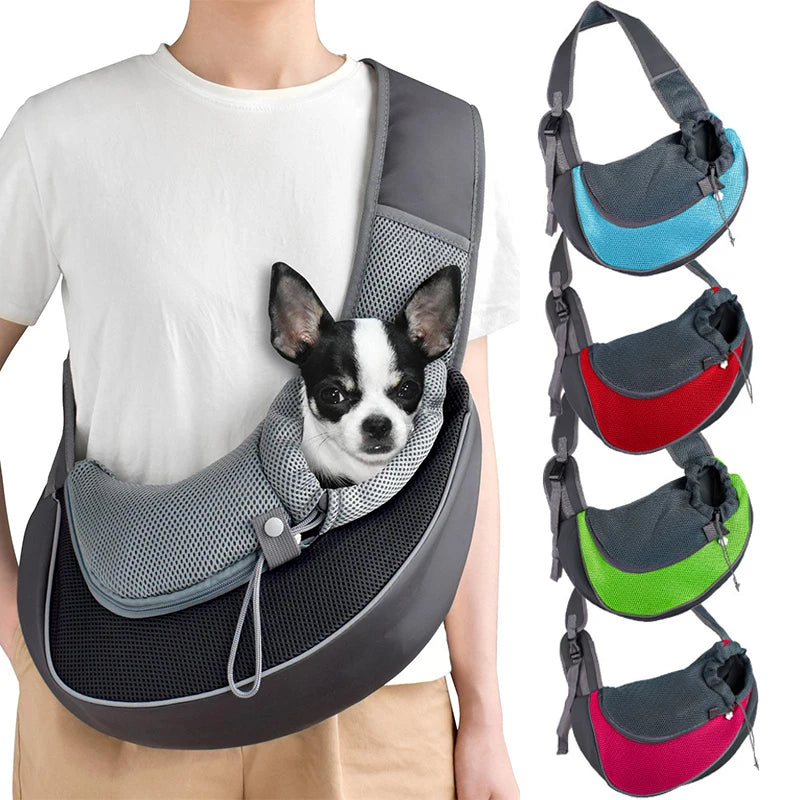 Person carrying a small dog in a gray pet sling with color options displayed on the side.