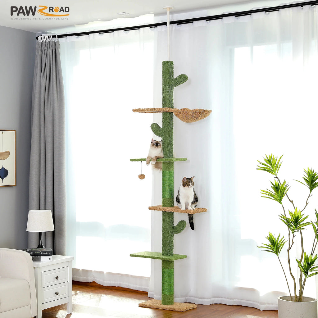 Cat tree with multiple levels and shelves in a room with curtains and a plant.