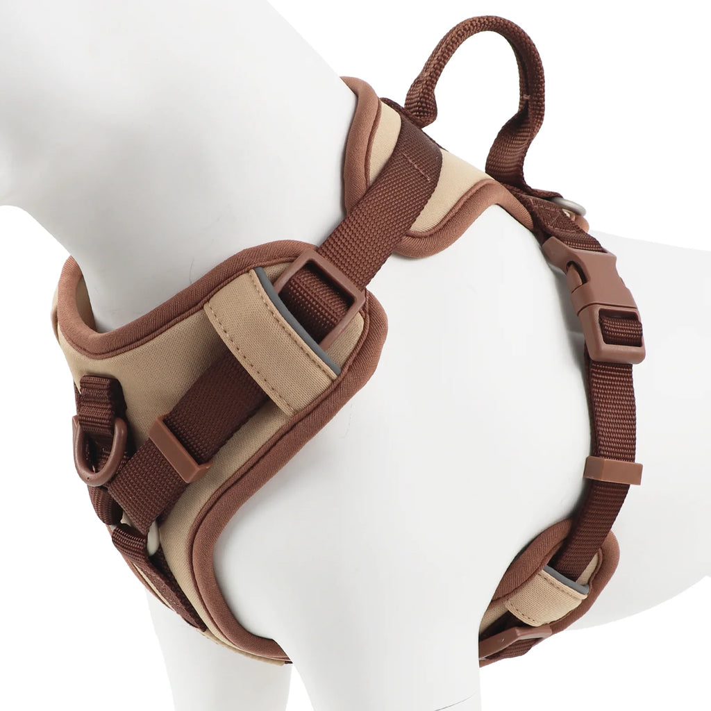 Brown and beige dog harness on a mannequin with a white background