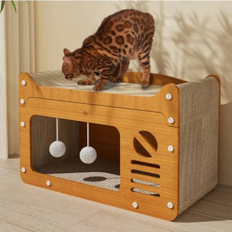 Wooden cat playhouse with a cat climbing on top