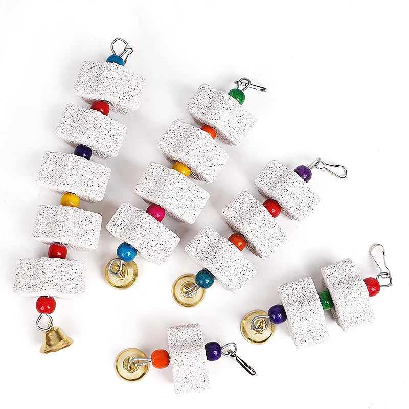Bird toy with colorful beads and bells on a white background